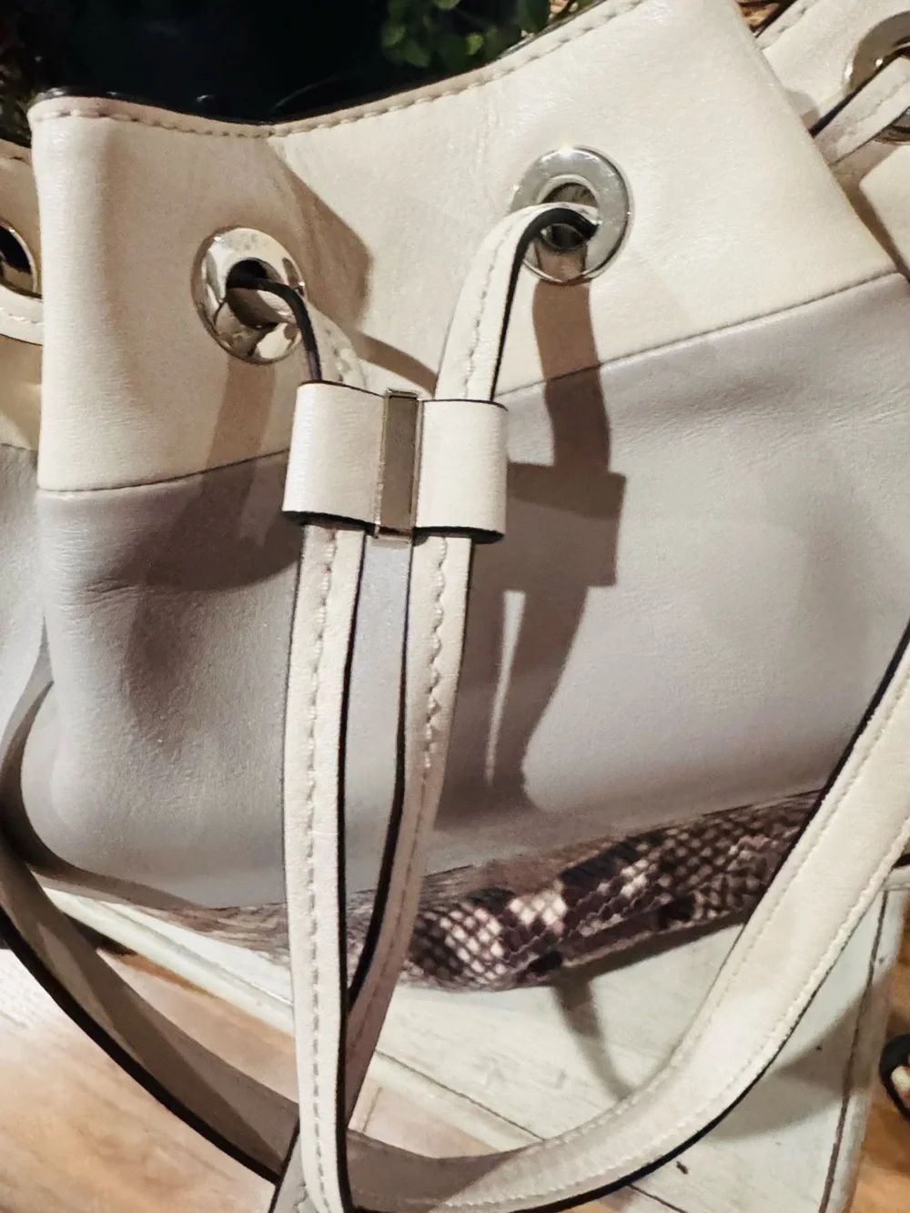Michael Kors women’s White Drawstring Bucket Bag with Snake-Print Panel